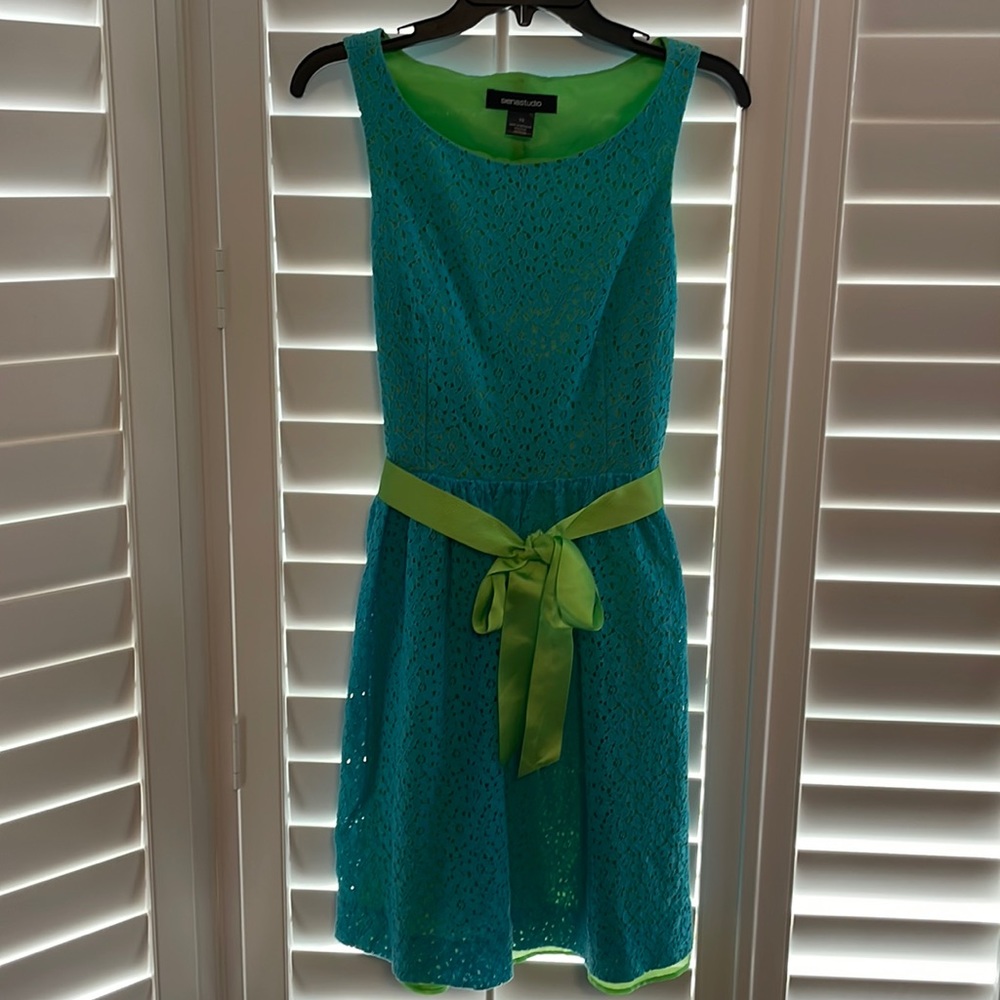 Sienastudio midi dress, sleeveless with side zipper.  Blue overlay, green lining